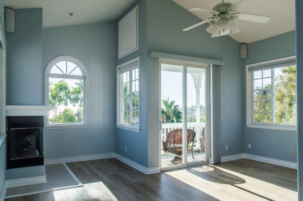 trendy-modern-interior-living-room-with-blue-walls-white-windows interior house