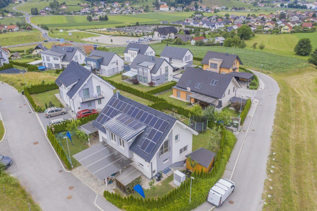 aerial-view-private-houses-with-solar-panels-roofs houses