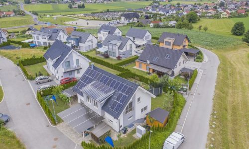 aerial-view-private-houses-with-solar-panels-roofs houses