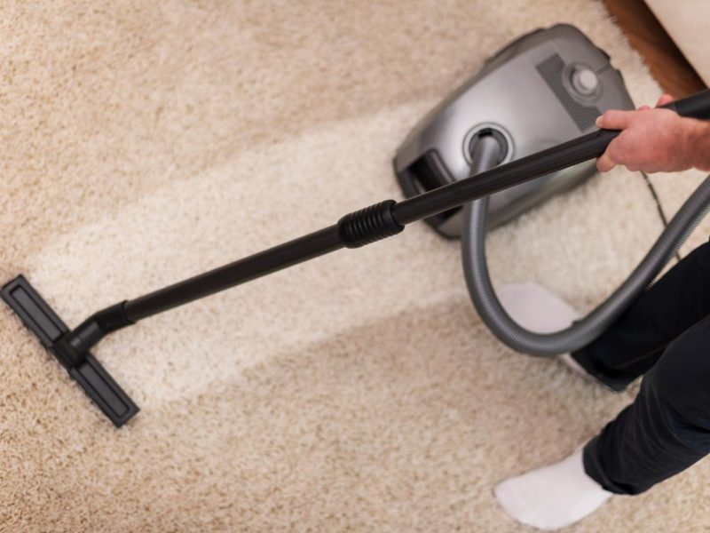 close-up-vacuuming-carpet hoover